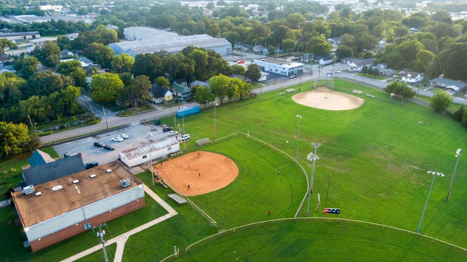 Aerial view of a youth baseball complex with multiple diamonds